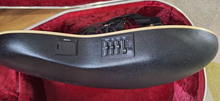 Electric/acoustic guitar, model AE138. Approx 20 years old. with hard case