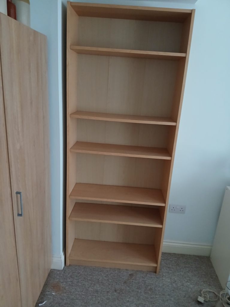 Tall Ikea Billy bookcase. Oak finish.