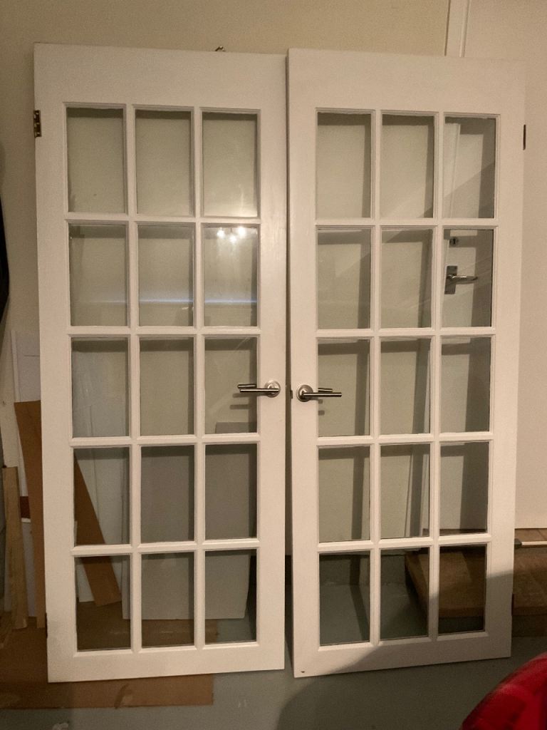 Internal glass panel doors