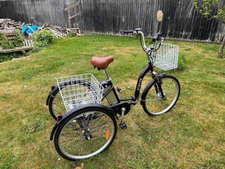 Jorvick Annie E-assist 7 speed electric folding tricycle.