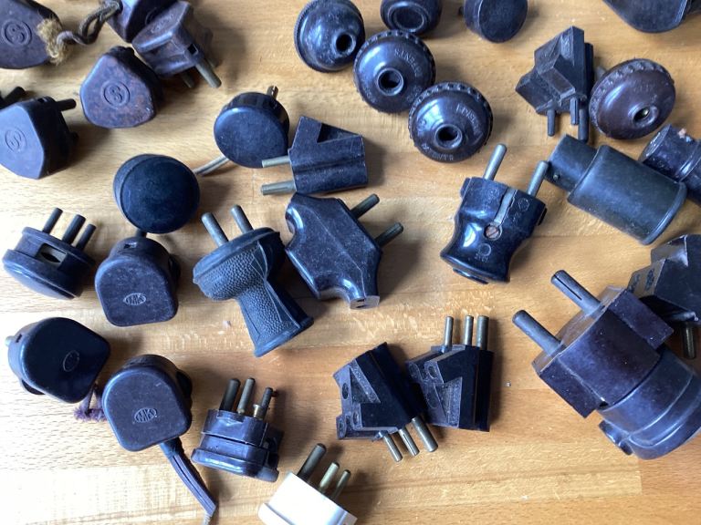 A Large Selection of Vintage Plugs and Light Fittings