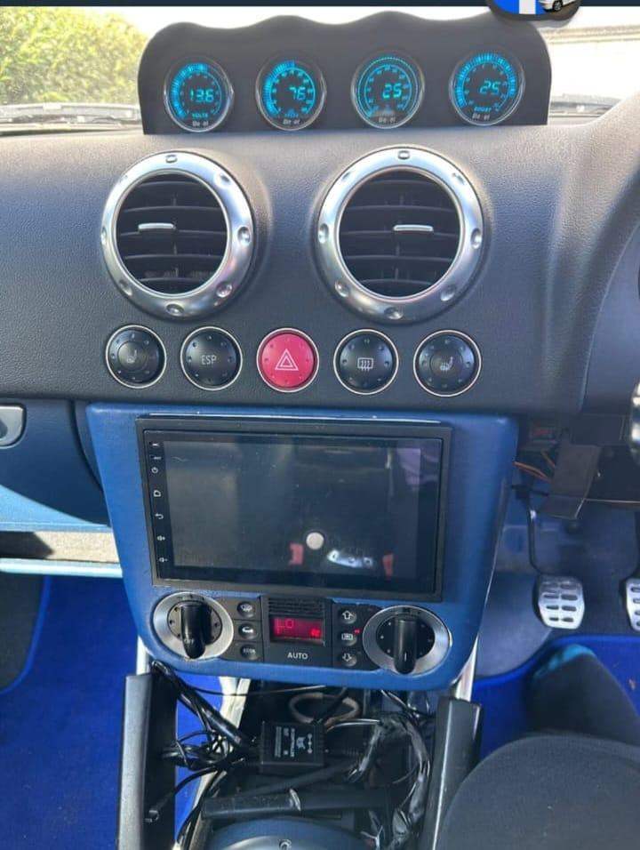 Multi media touch screen head unit with front and rear cameras