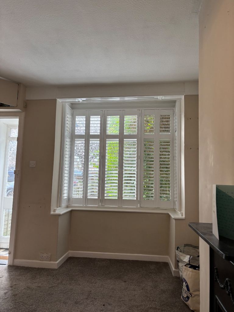 White plantation shutters x2 bay window sets