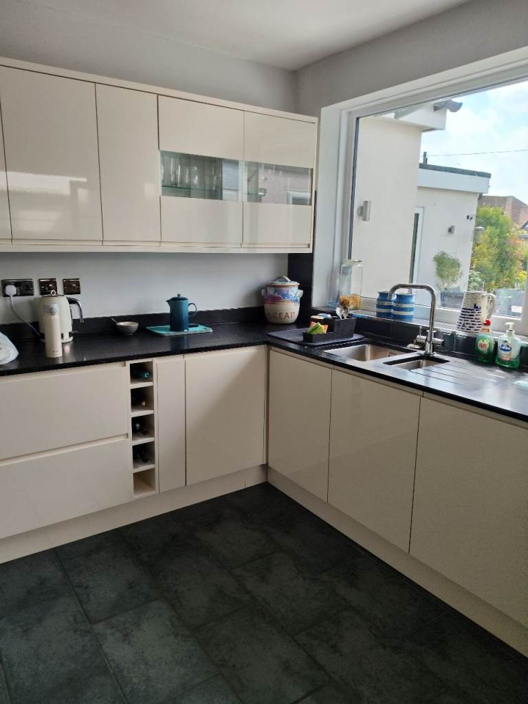 Cream Gloss Kitchen Units with Dark Worktops