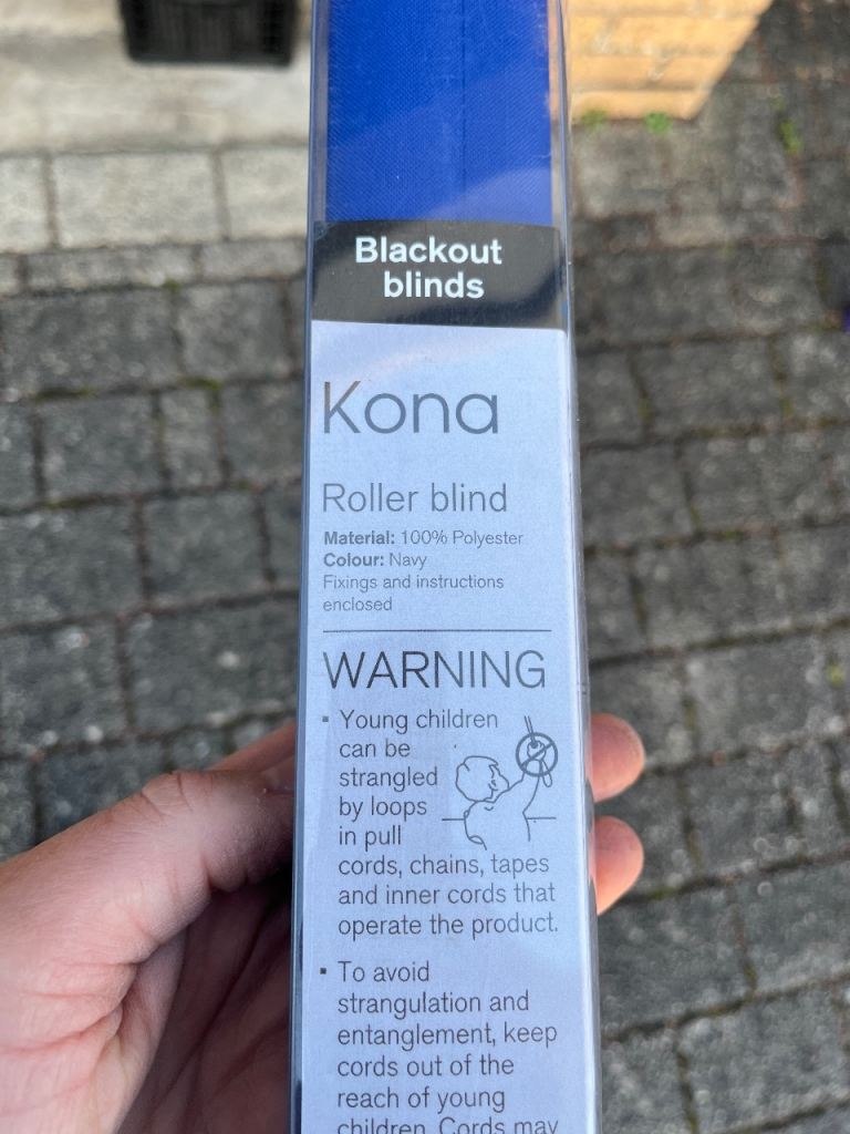 Large blue roller blind (blackout)