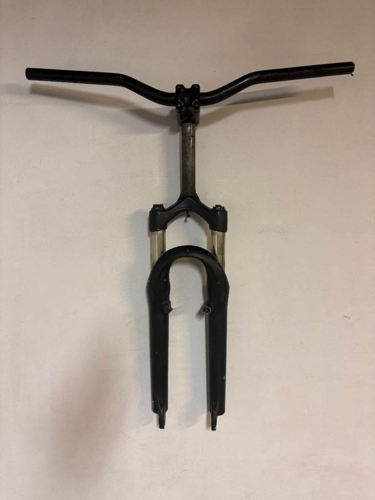 Full suspension front forks, stem, and handlebars. Fully adjustable. Good working order