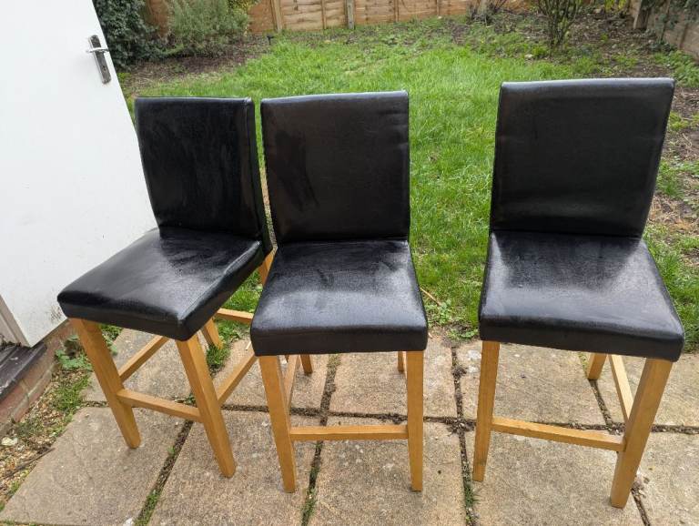 3 leather bar stools and bar table