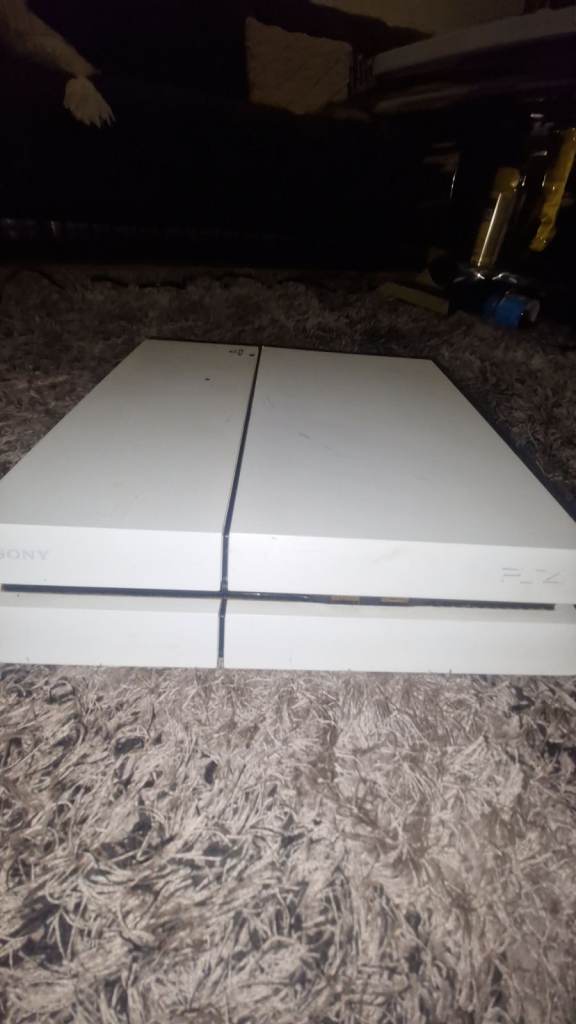 Sony PlayStation 4 (PS4) White Console - Good Condition