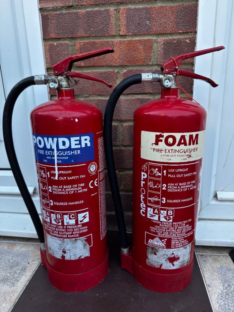 Pair of Powder and Foam Fire Extinguishers – Used Condition