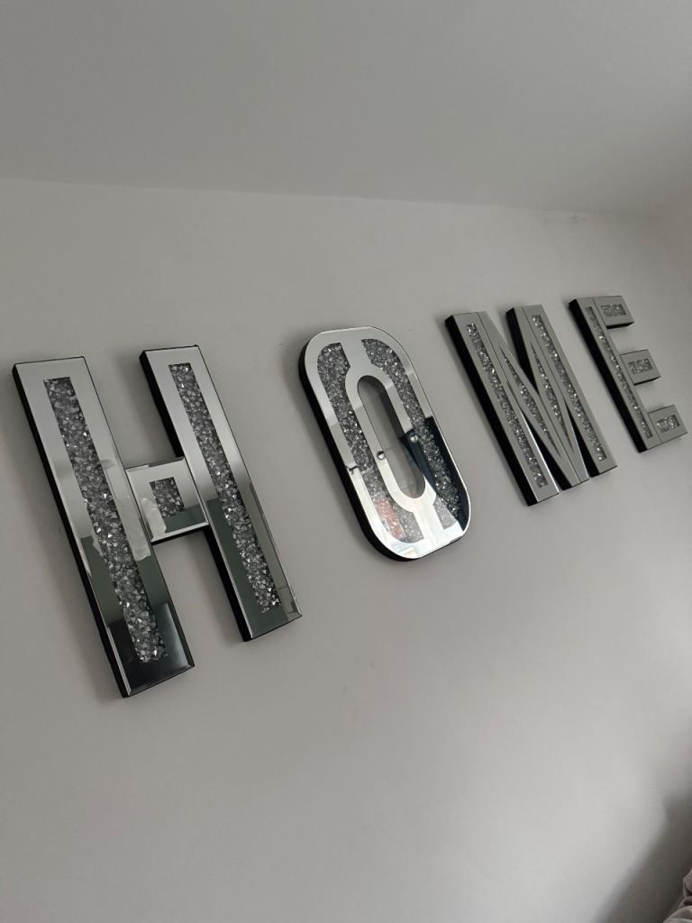 Mirrored home sign 