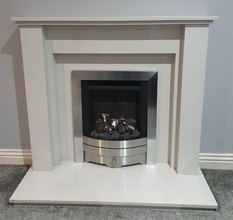 Marble look Fire place in pristine condition