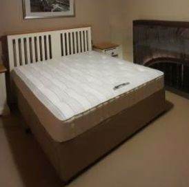 Double Bed with Beige Base and Wood Headboard – Good Condition