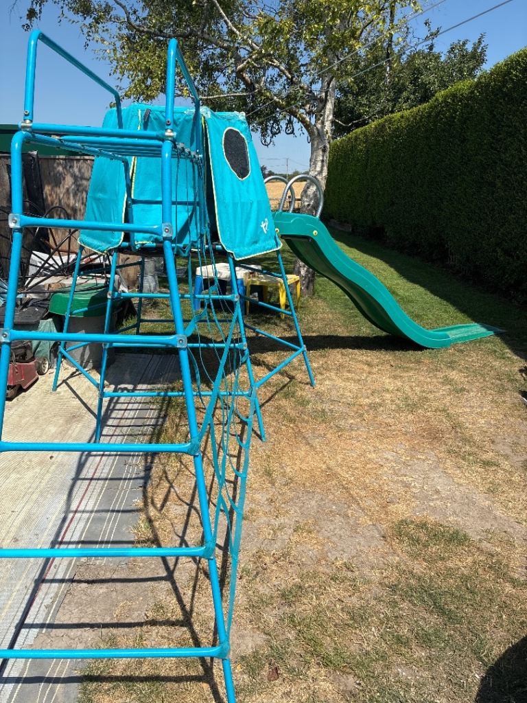 TP Toys Explorer Den Metal Climbing Frame with 8ft Ripple Slide and Monkey Bridge