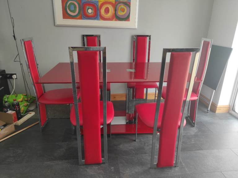 Modern  Red glass and chrome dining table and six chairs 