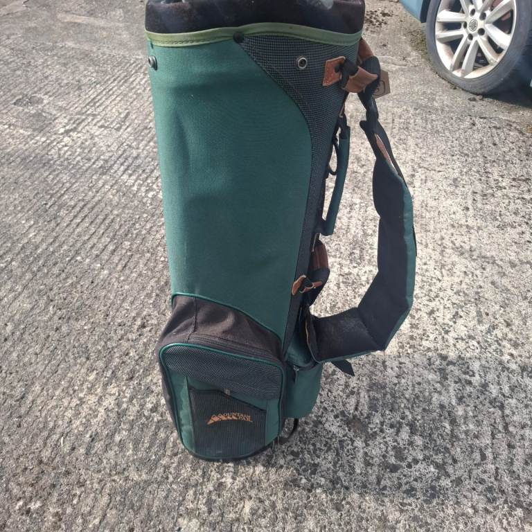 Golf bags and clubs