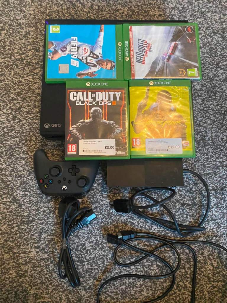 Xbox One Console with Controller and Games – Good Condition