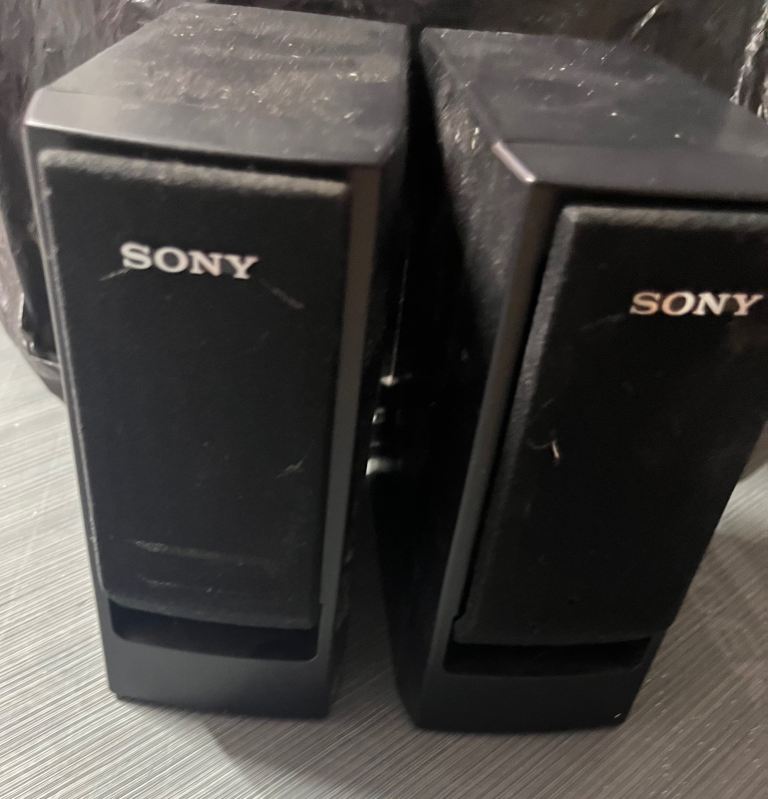 Pair of small Sony surround sound speakers 