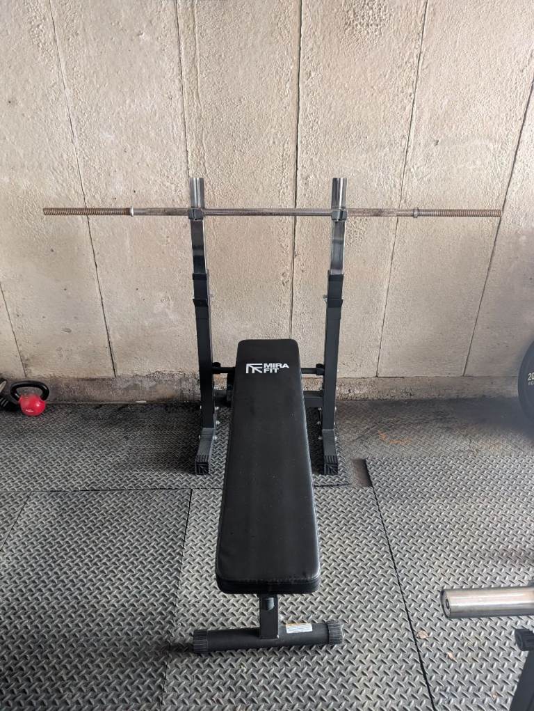 Weights bench, bar, rack and 110kg in weight plates 