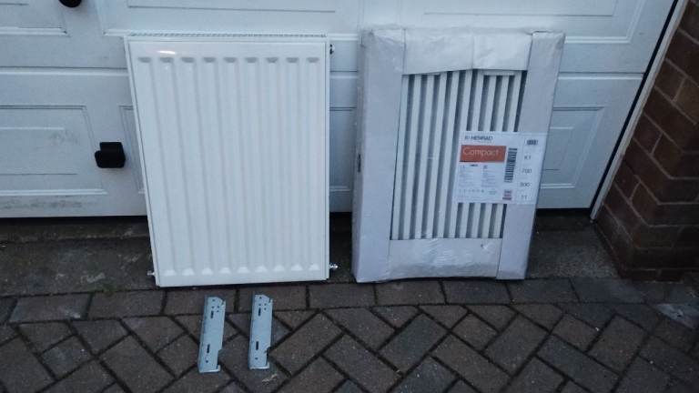 2 Stelrad radiators 700h 500w ( brand new single K1 ) double is 3 yrs old