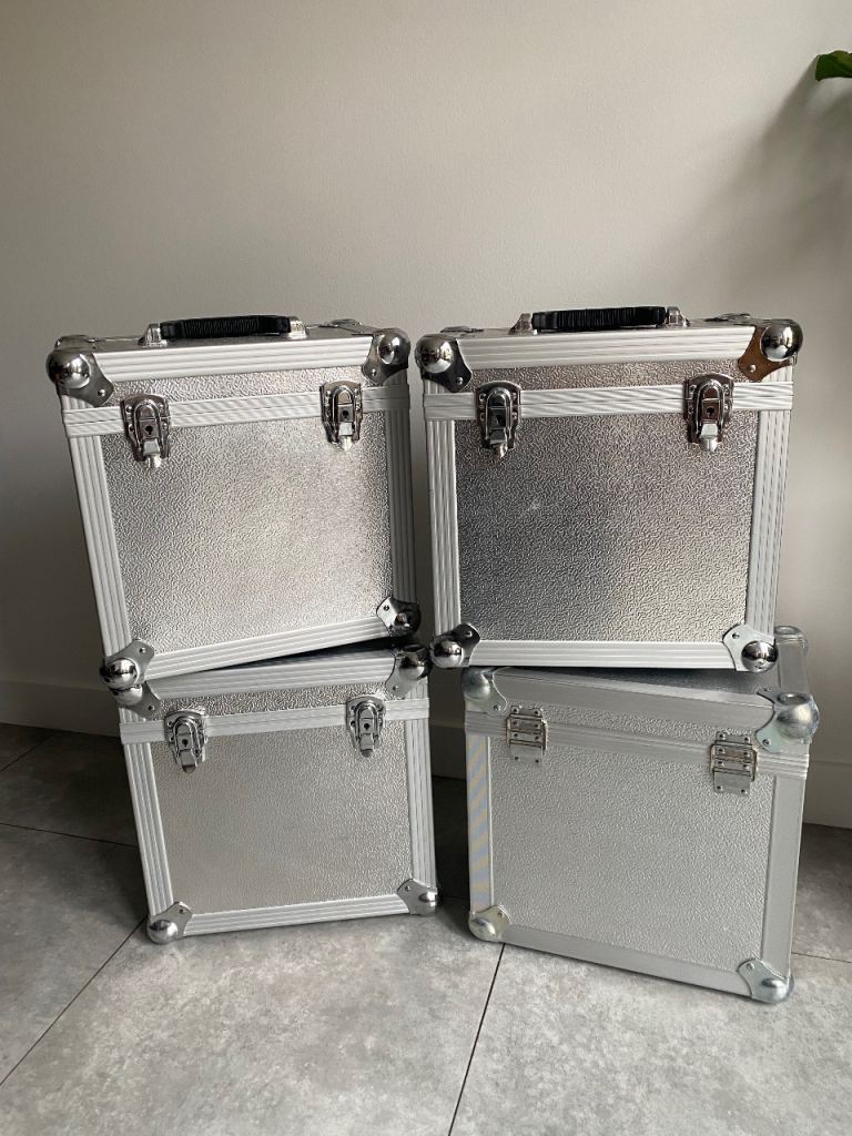 4 metal flight cases for 12” vinyl 