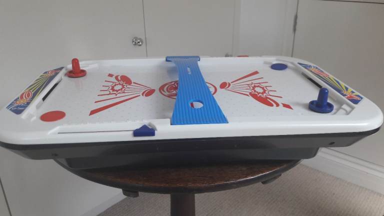 Kids air hockey table