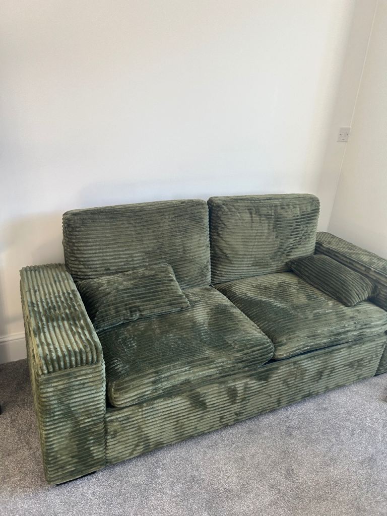 Two seater cord green sofa 3 months old