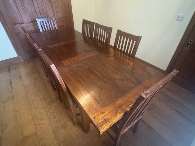 Solid wood 8 seat extendable dining table and chairs