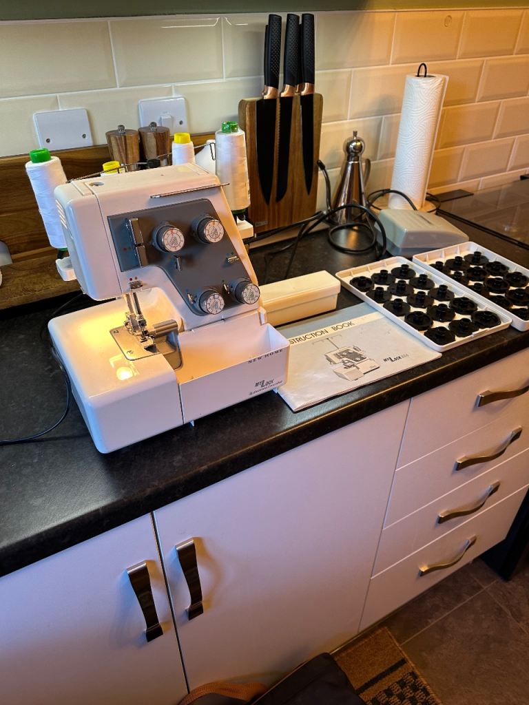 New home overlocker sewing machine and accessories £150