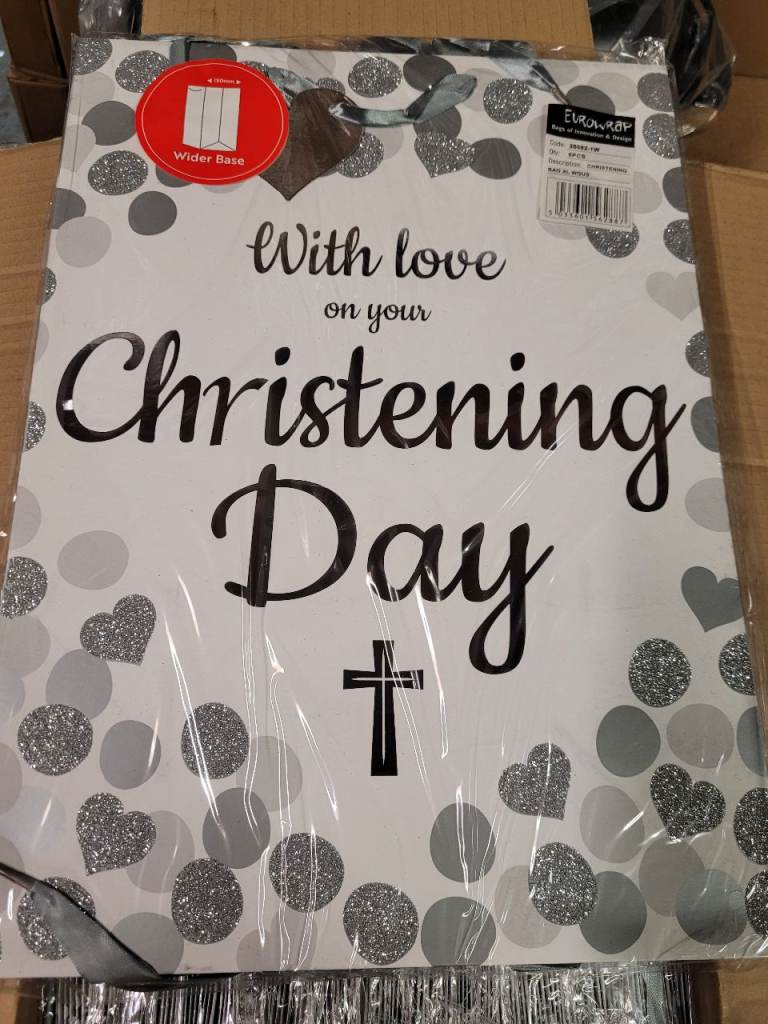 A new box of 72 lovley silver and white large christening gift bags. 