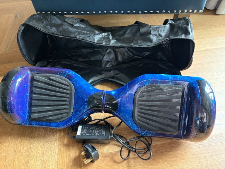Blue Hoverboard with Charger and Carry Bag – Good Condition