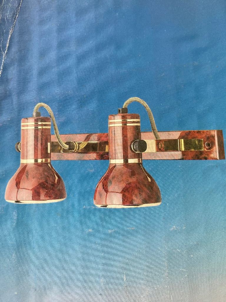 Morgan twin spotlight bar with tortoise shell finish . 