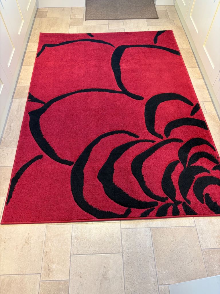 Deep Red / Black Rug. Reduced 21/11/25