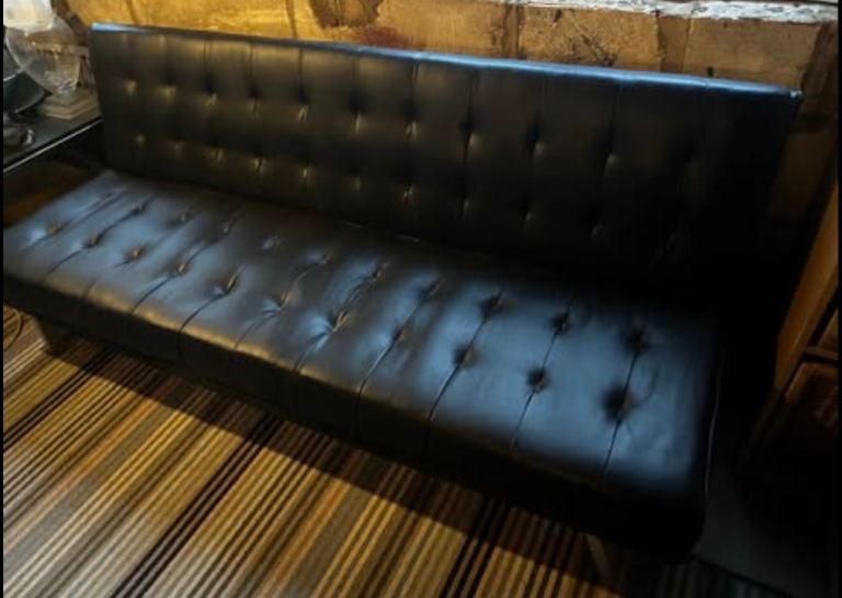 Black leather 3 seater sofa bed with chrome legs 