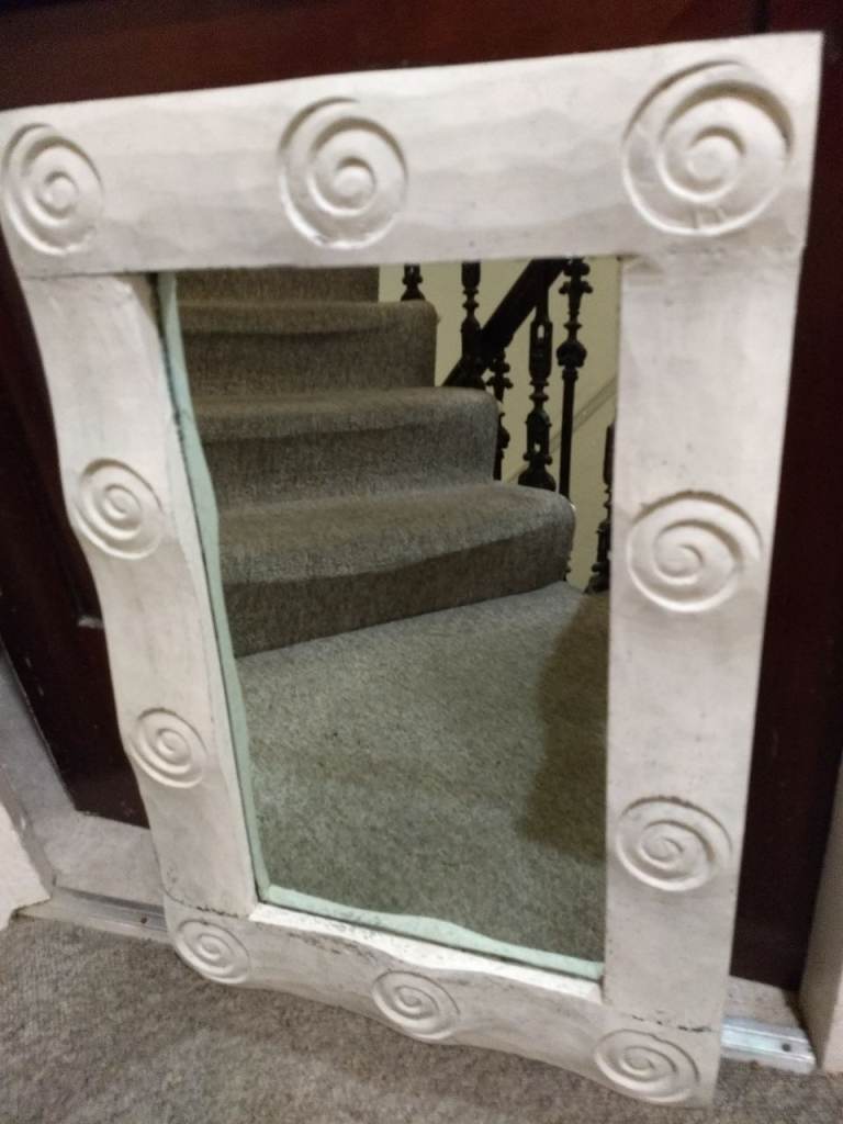 Wall mirror. Nice carved effect frame. 60x40cm
