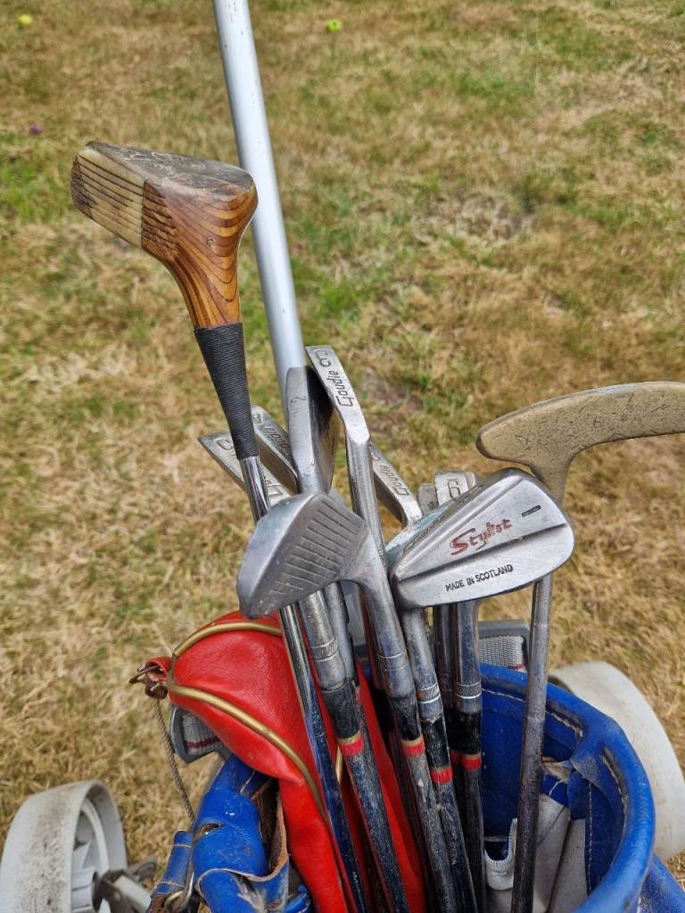Golf bag and Titliest Tornado Trolley with set of left handed golf clubs