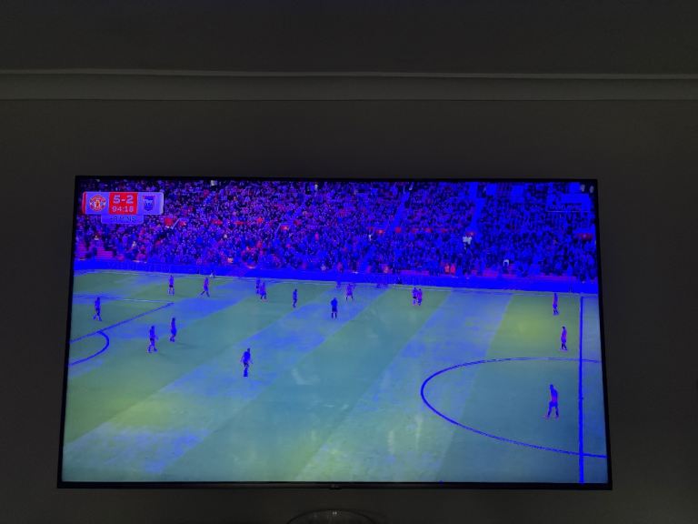 LG 65” television plus stand & remote control