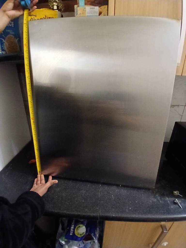 Stanelsss steel gas cooker splashback. 