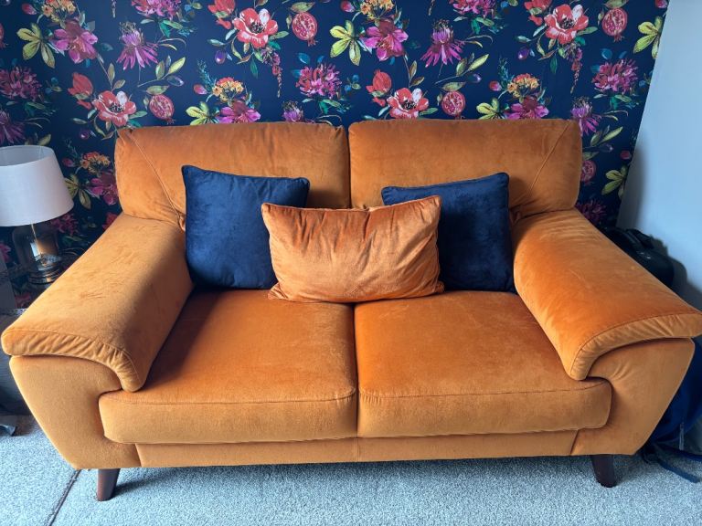Lovely orange 2 seater sofa brand new 