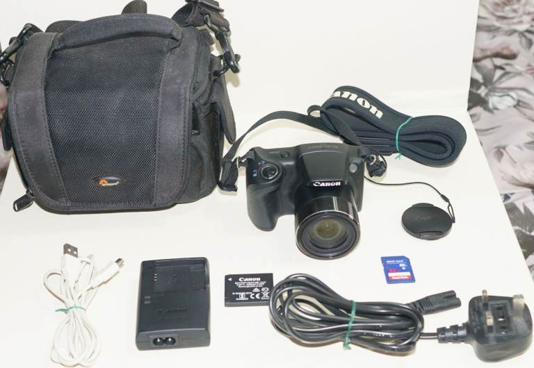 Canon POWERSHOT SX430 is 20MP 45x Zoom Digital Camera + 32GB Memory Card & Bag
