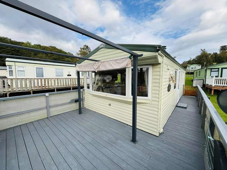 Bargain static caravan now only £13,995 with huge decking and no site fees until 2027!