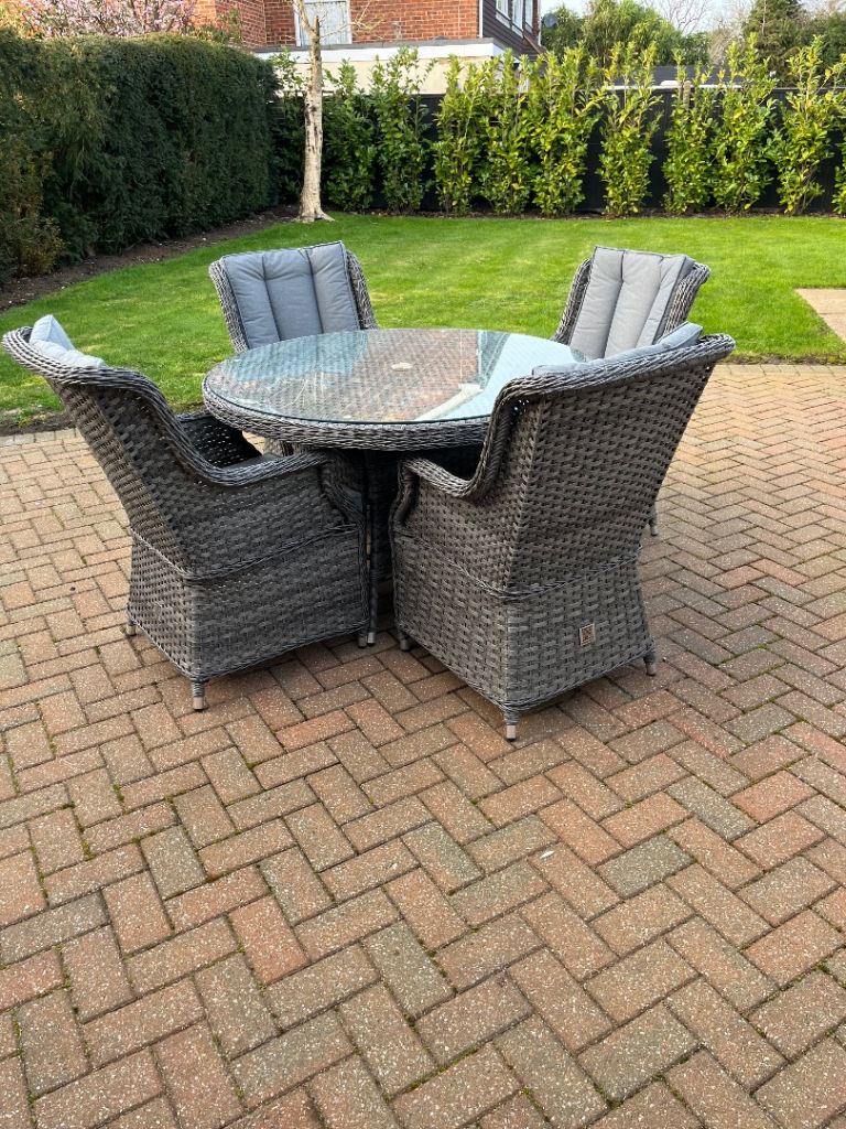 4 seater round rattan dining set with glass