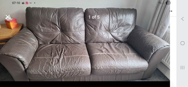 Three seater leather settee 