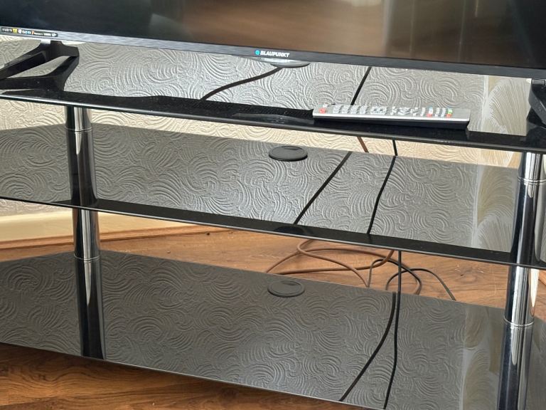 Glass and chrome television stand