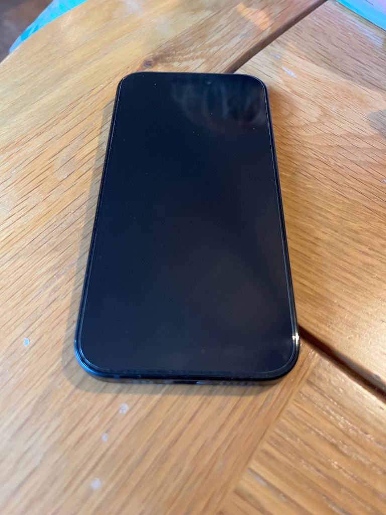 Apple iPhone 15 with case and screen protector 