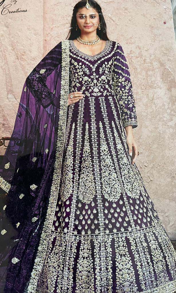 Woman’s party/ wedding semi stitched gown burgundy in gold embroidery 