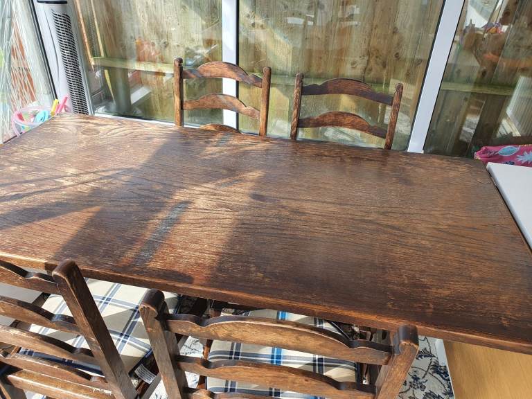 Solid wood dining table with 4 chairs