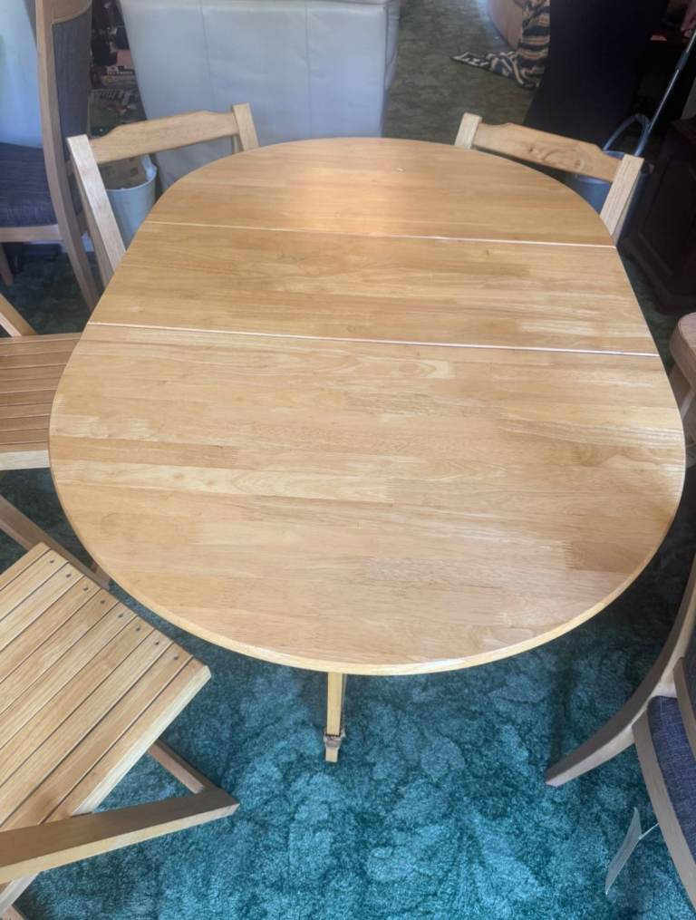 Pine Gatefold Table with 4 fold away chairs
