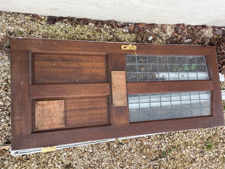 Solid wood external door with two leaded glass panels 