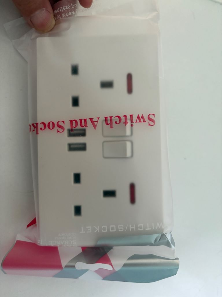 Double socket and switch with USB plug