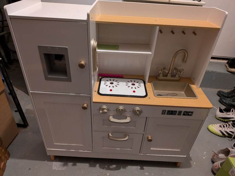 IKEA kids kitchen with various accessories 
